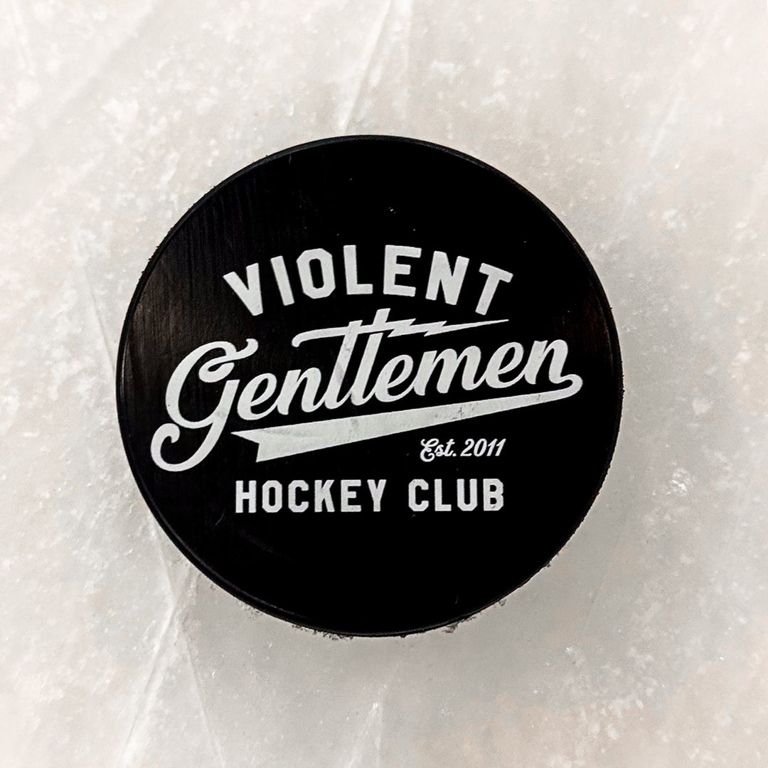 Brass Bonanza Hockey Puck