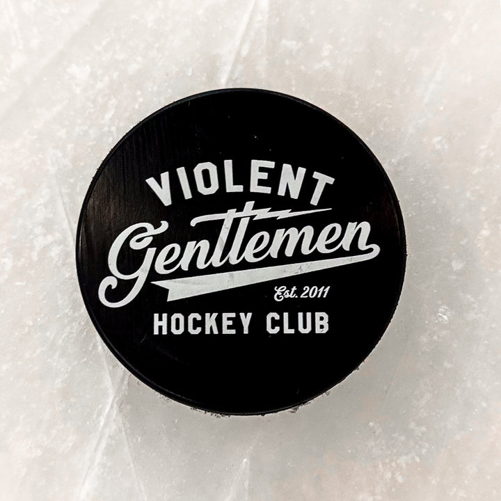 Brass Bonanza Hockey Puck