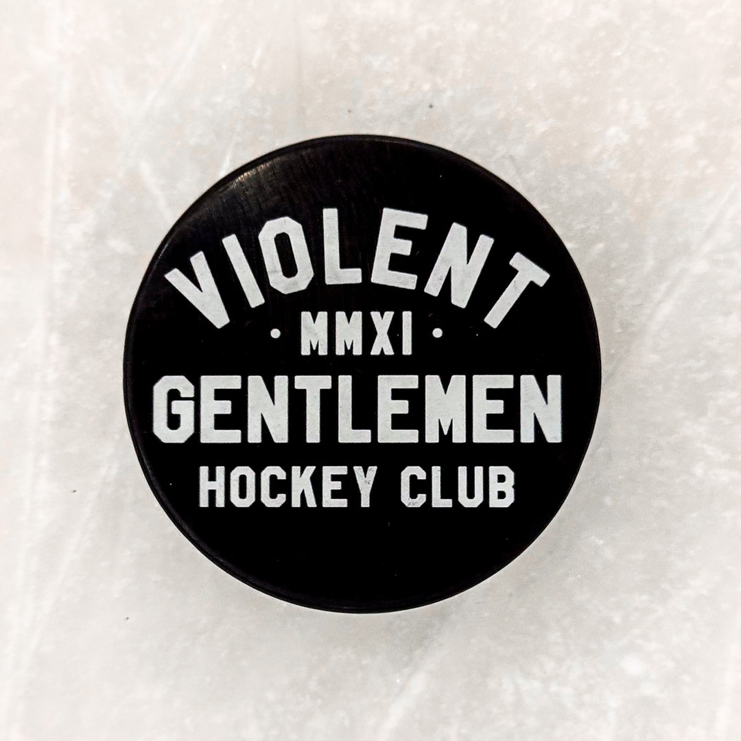 Loyalty Hockey Puck