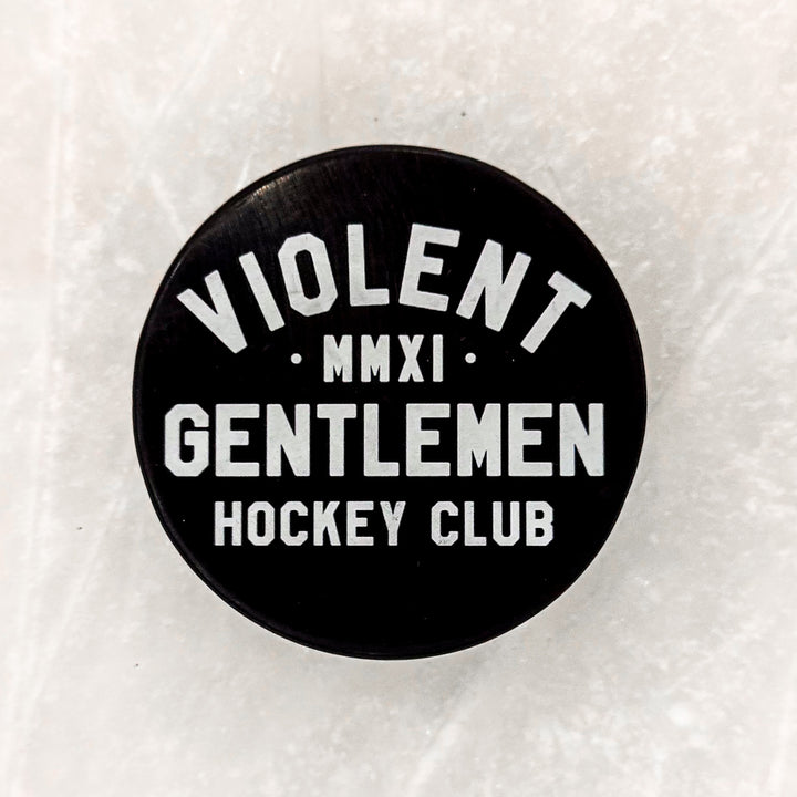 Loyalty Hockey Puck